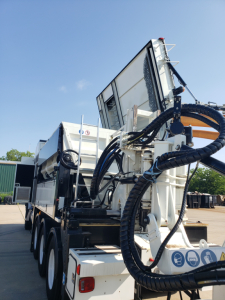 Volvo VHD86B300 trenching truck front view showing hydraulic hoses and control panels
