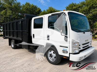 Isuzu NPR HD dump truck in white with a black dump bed, side view showing cab and front and right side, VIN and stock labels not legible.
