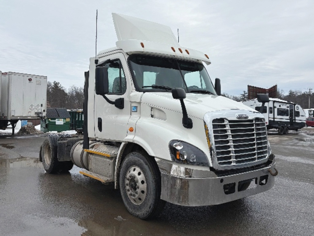 White 2017 Freightliner Cascadia 113 conventional daycab truck showing front view with chrome grille and hood raised.