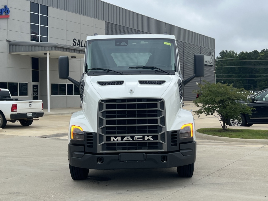 Front view of white 2027 Mack AN64T conventional daycab truck with black grille and amber daytime running lights.