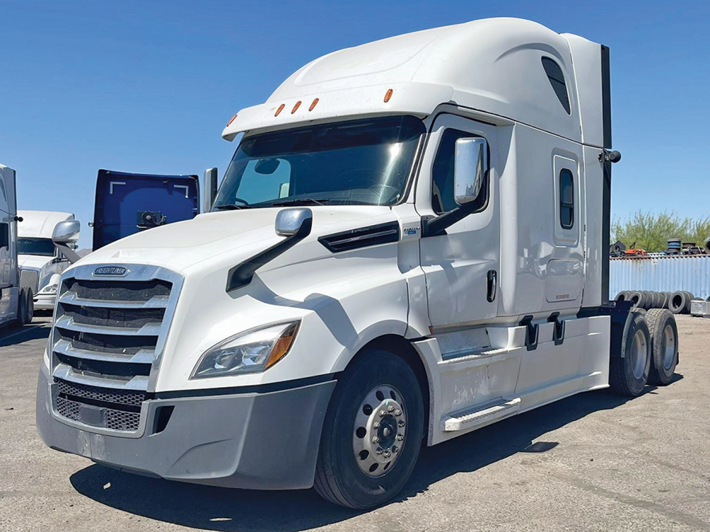 2020 Freightliner Cascadia 126 aftermarket sleeper tractor truck side view showing cab and front grille with chrome accents.