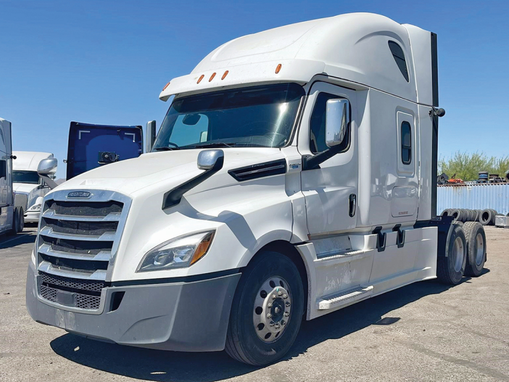 2020 Freightliner Cascadia 126 aftermarket sleeper tractor truck side view showing cab and front grille with chrome accents.