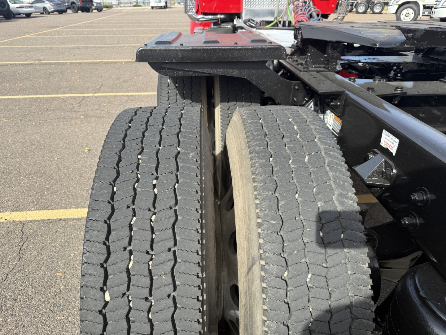 Kenworth T880 rear dual tires and chassis showing wheel area and frame