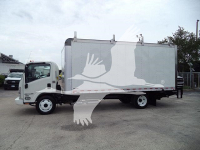 Isuzu NPR HD box truck side view showing cargo box and cab in used condition.