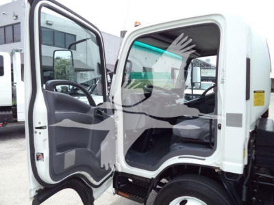 Isuzu NPR HD truck cab exterior with the driver-side door open showing the interior and steering wheel.