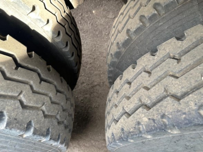 Trailer tires close-up showing tread pattern for Jet Air Ride Side Dump trailer.