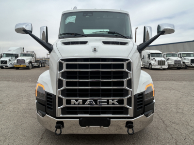 Front view of a white 2027 Mack AN64T conventional daycab truck showing prominent grille, chrome bumper, and large side mirrors.