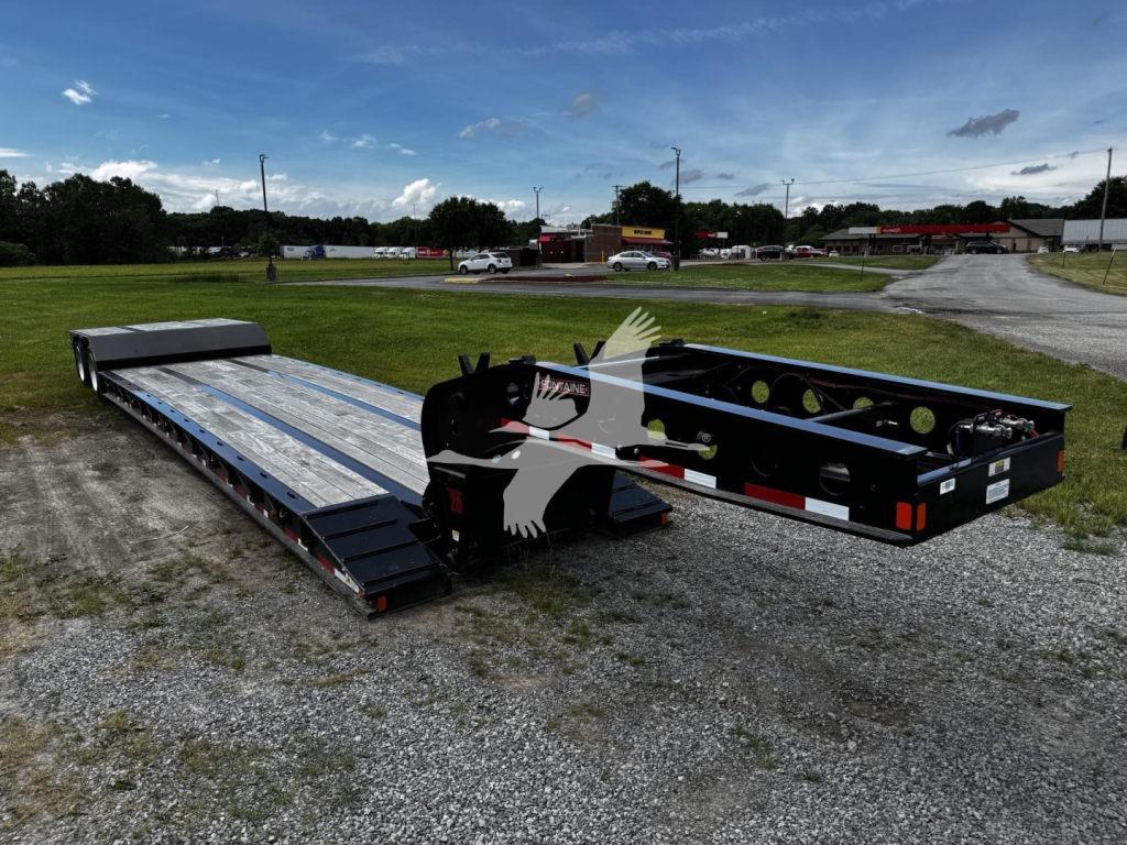 Flatbed trailer with extended lowboy deck showing Fontaine N20 branding and equipment racks.