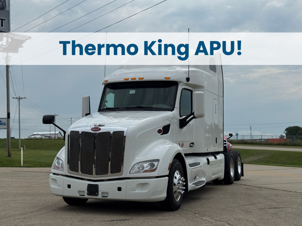 Peterbilt 579 conventional sleeper truck in white, front view, with bold grille; overlay text reads Thermo King APU across the top of the image.