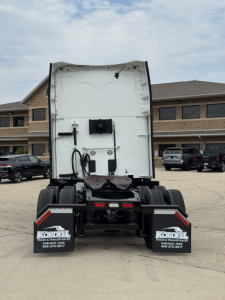 Rear view of a Peterbilt 579 truck tractor showing fifth wheel, rear bumper, and mudflaps with Kordell branding.