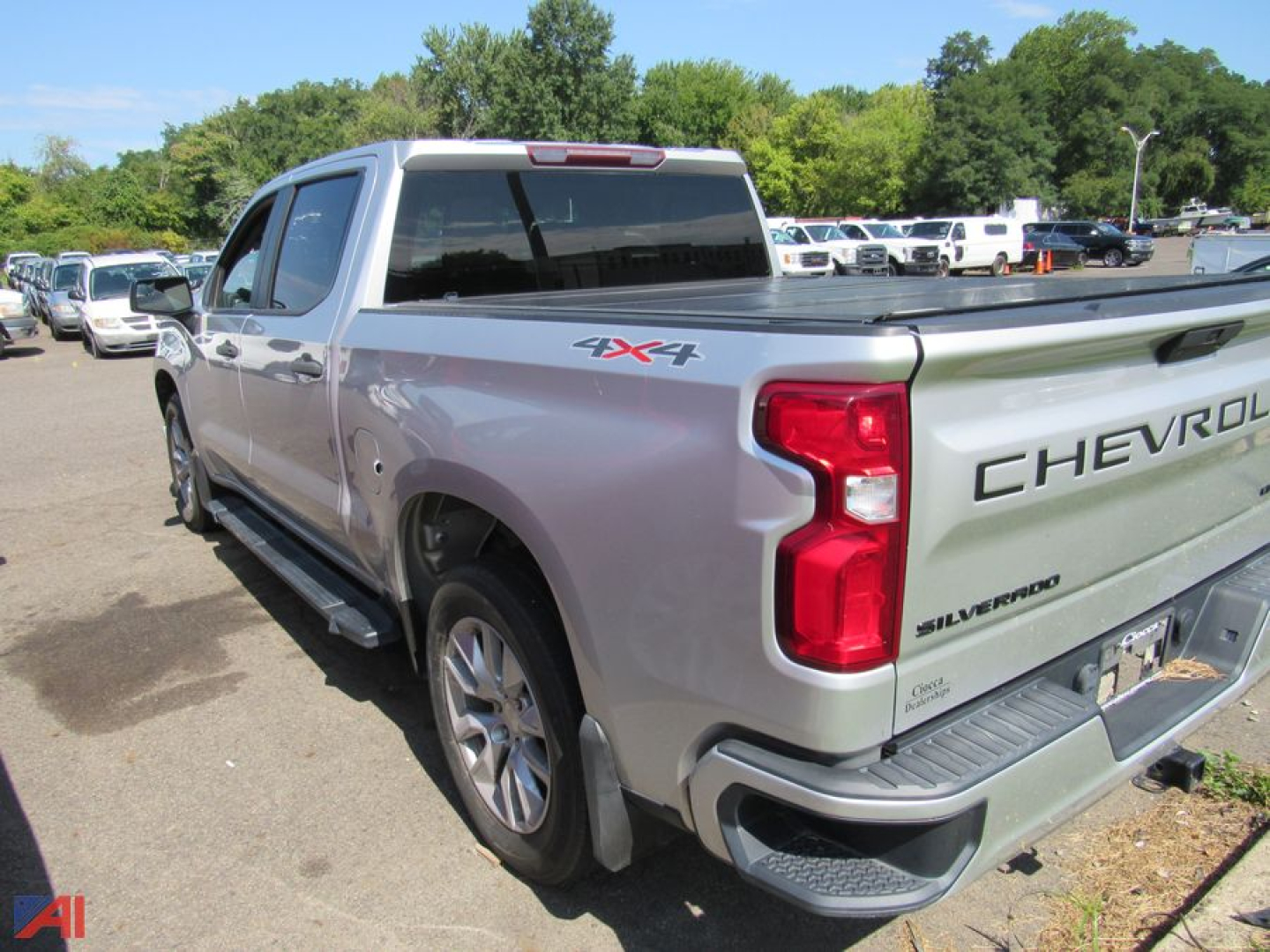 Chevrolet Silverado 1500 Limited pickup truck rear-left view showing 4x4 badge and tailgate text.