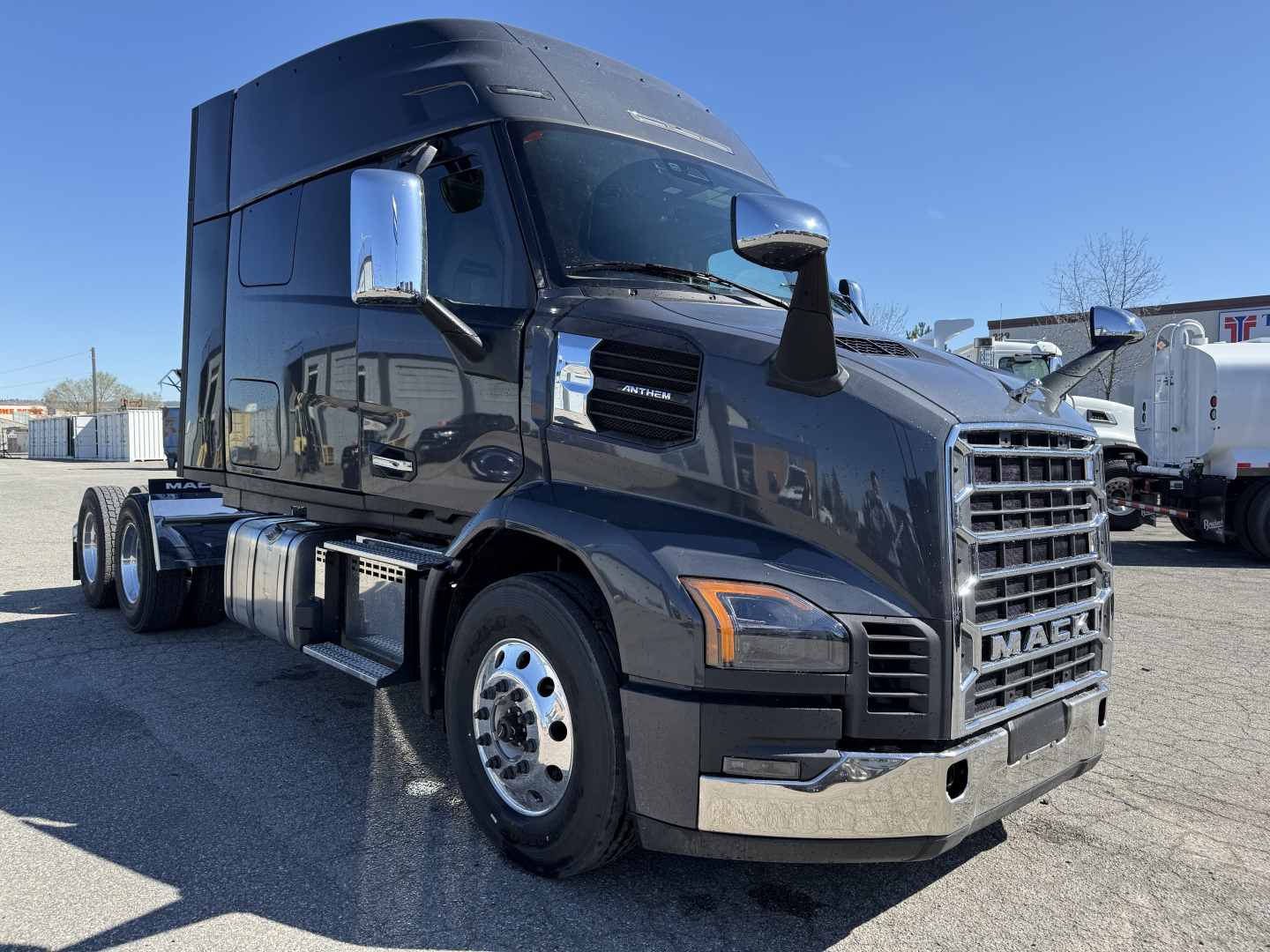 Truck image: 2027 Mack AN64T64 conventional sleeper tractor with chrome grille, large side mirrors, and dual rear axles. Visible text: none legible from image except vehicle features.