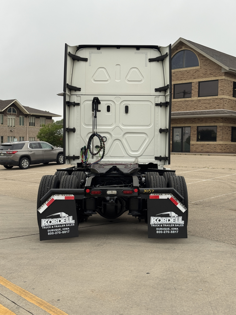 Rear view of a Freightliner Cascadia 126 tractor showing the back doors, wiring harness, and rear mud flaps with Kordel branding.