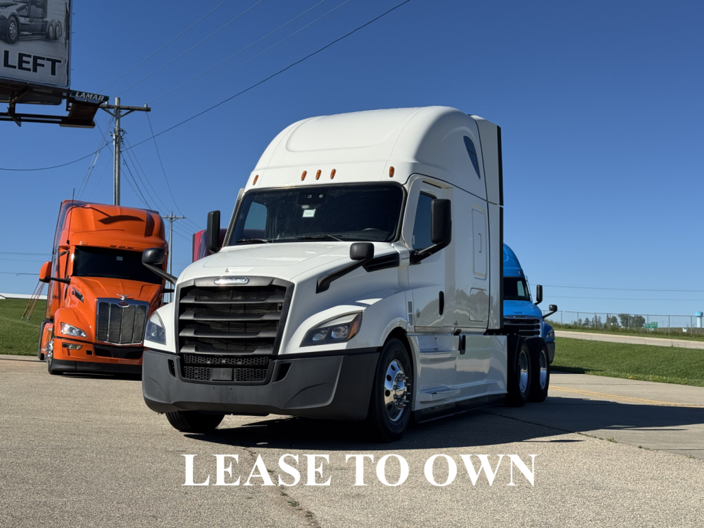 White 2021 Freightliner Cascadia 126 semi-truck in a dealership lot, front and side view, ‘LEASE TO OWN’ text overlaid in white.