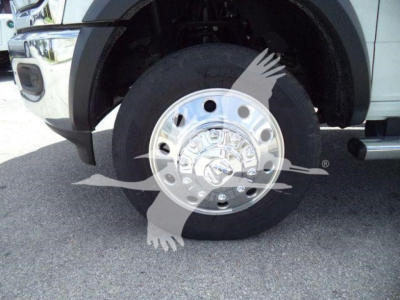 Wheel close-up on Ram 4500 SLT chassis showing steel hub and tire, front wheel assembly.