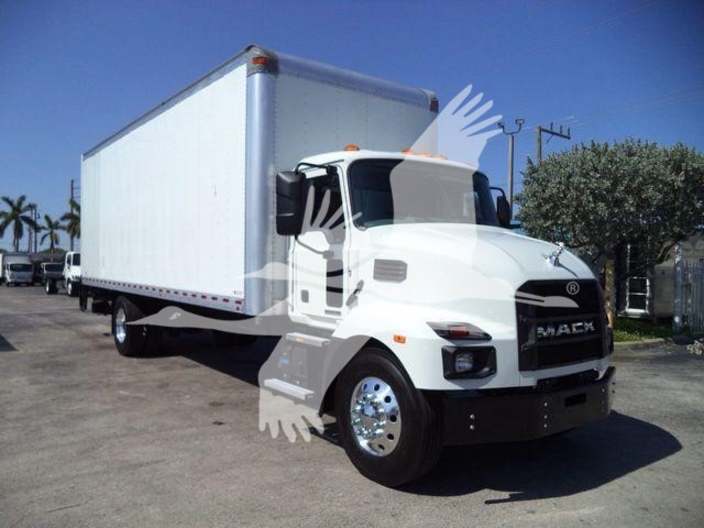 2026 Mack MD6 box truck with large white cargo box, front grille shows MACK branding, cab and mirrors visible, stock number MD6BOX26 label not shown on image.