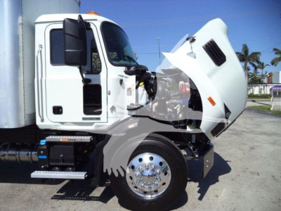 Mack MD6 box truck cab with hood open, showing engine bay and front wheel, side steps visible.