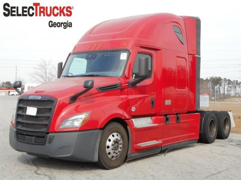 Front-left view of a red 2022 Freightliner Cascadia 126 sleeper tractor with SelectTrucks Georgia watermark.