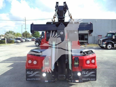 Winch-equipped truck front view with heavy-duty crane mounting and two red vehicle housings visible on either side; MPL60MVEXCABRED stock label in listing details.
