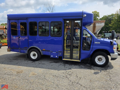 Blue 2018 Ford E-Series passenger bus shown in side and front view with open front door and steps.