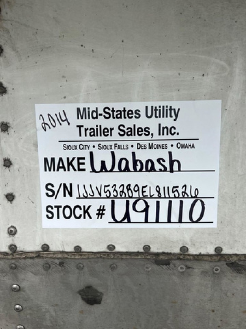 Plate on trailer showing Make-Wobash logo and S/N 1JJV532B9EL811526, Stock U91110, 2014 Mid-States Utility Trailer Sales label.