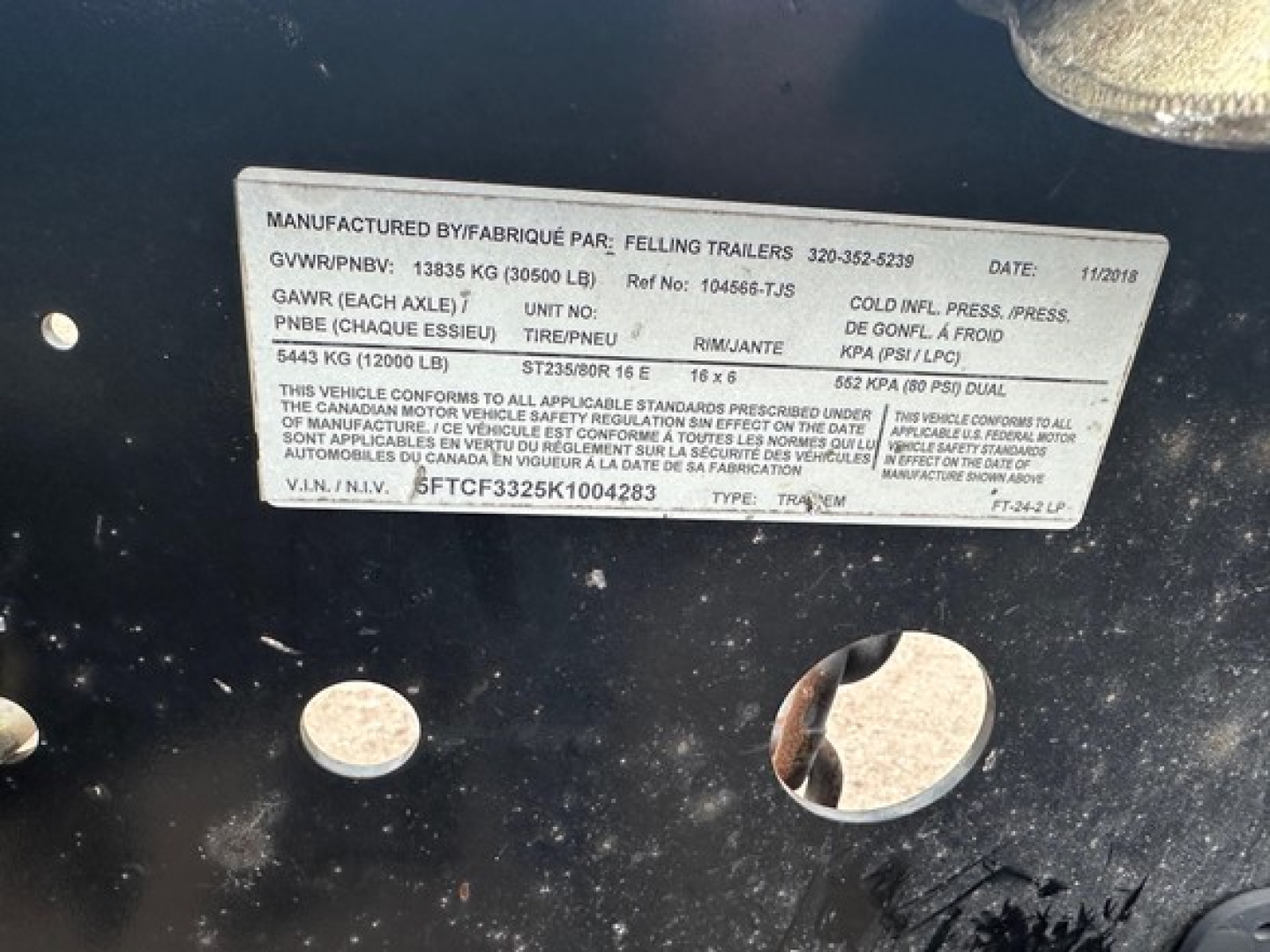Manufacturer plate label on trailer showing GVWR/PNBV 13865 KG (30600 LB), tire info, GAWR, and VIN 5FTC5323K1004283. Date 11/2018. Felling Trailers logo.