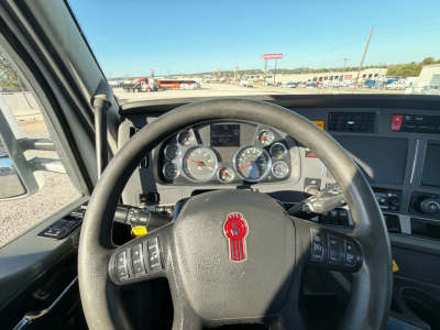Kenworth T880 interior steering wheel and dashboard view with gauges and steering controls