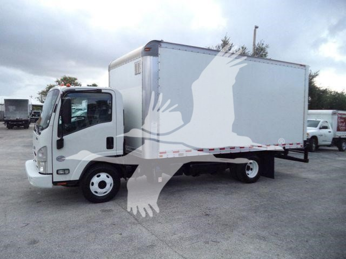 Isuzu NPR-HD box truck shown in side view with cargo box, 2020 model year, stock T11138FM.