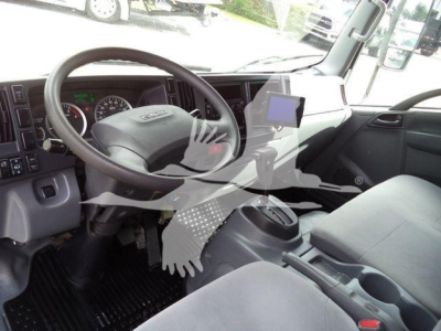 Isuzu NPR HD truck interior showing steering wheel, dashboard, and center console with mounted tablet device.