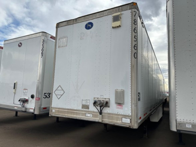 Great Dane Champion trailer side view showing rear with dock lock and serial number 8660.1 on the corner post.