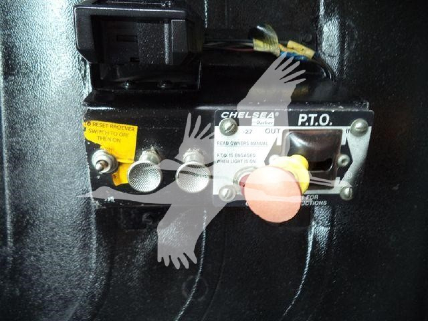Chelsa P.T.O. control panel on Freightliner M2 106 drivetrain with label and knobs visible