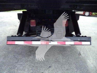 Rear view of Freightliner M2 106 roll-off truck showing rear bumper and tail lights