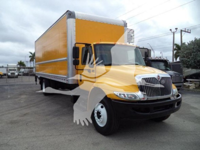 Truck cab and box truck showing 2019 International Durastar 4300 with yellow cargo box and black bumper.