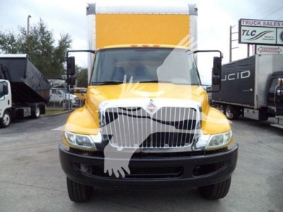 2019 International Durastar 4300 box truck showing front view with yellow cab and chrome grille.