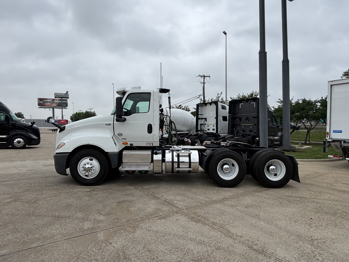 Truck chassis of a 2019 International LT daycab showing side profile and dual rear axles.
