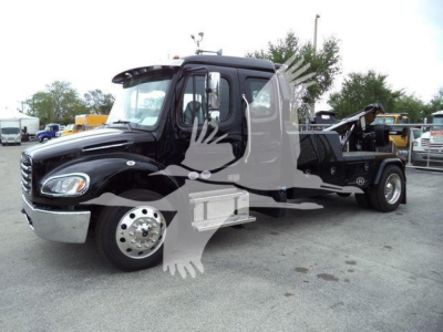 Freightliner M2 106 tow truck side view with black cab and winch equipment, stock JU6169FM.