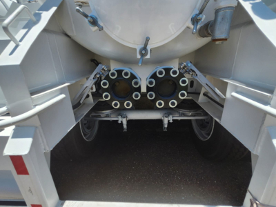 Vacuum trailer rear with twin circular inlet ports and mounting hardware visible