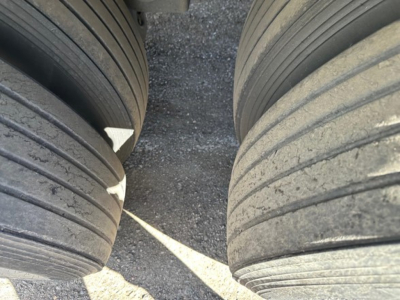 Trailer tire tread close-up showing large dual tires for a 2013 Utility 3000R storage trailer.