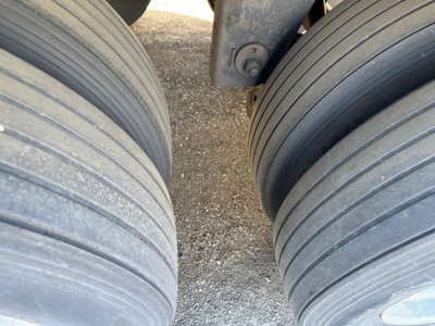 Trailer tires and undercarriage showing dual tires on a 2013 Utility 3000R trailer wheel area.