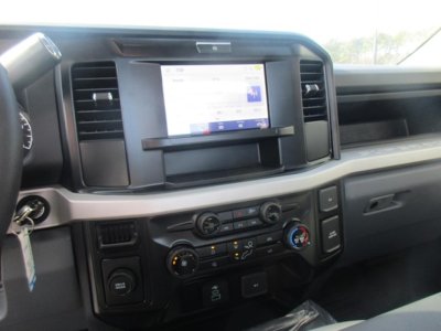 Ford F-450 cab and chassis interior dashboard and center touchscreen with controls and vents.
