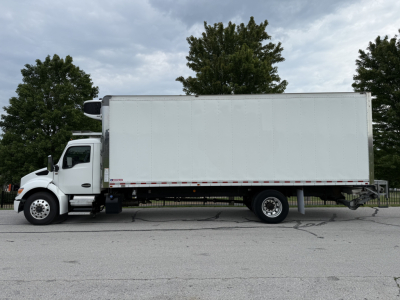 Kenworth T380 refrigerated truck side profile showing white box body and cab with wheelset.