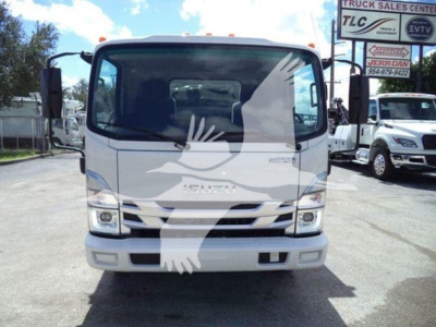 Isuzu NPR-HD truck front view in a dealership lot showing cab and grille, stock number T10448, windshield, headlights, and bumper.