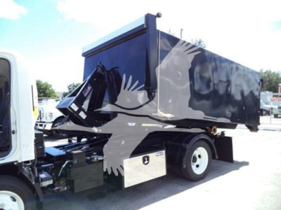Isuzu NPR HD hooklift truck with a blue dump cargo bed mounted on a cab chassis, side view showing hydraulic lift mechanism and wheel, stock number T10448.