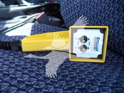 Stelluma controller handheld device with yellow housing on checkered blue seat, isuzu npr hd listing image