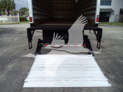 Truck with ramp lowered showing loading platform; empty cargo area; no visible labels or text on the interior walls.