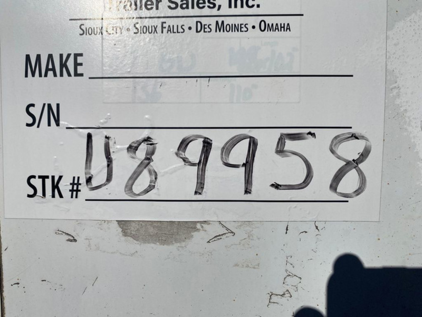 Trailer tag showing VIN 1GRAA96247T541033, Stock U89958, STK # 489958, Make and S/N fields blank.