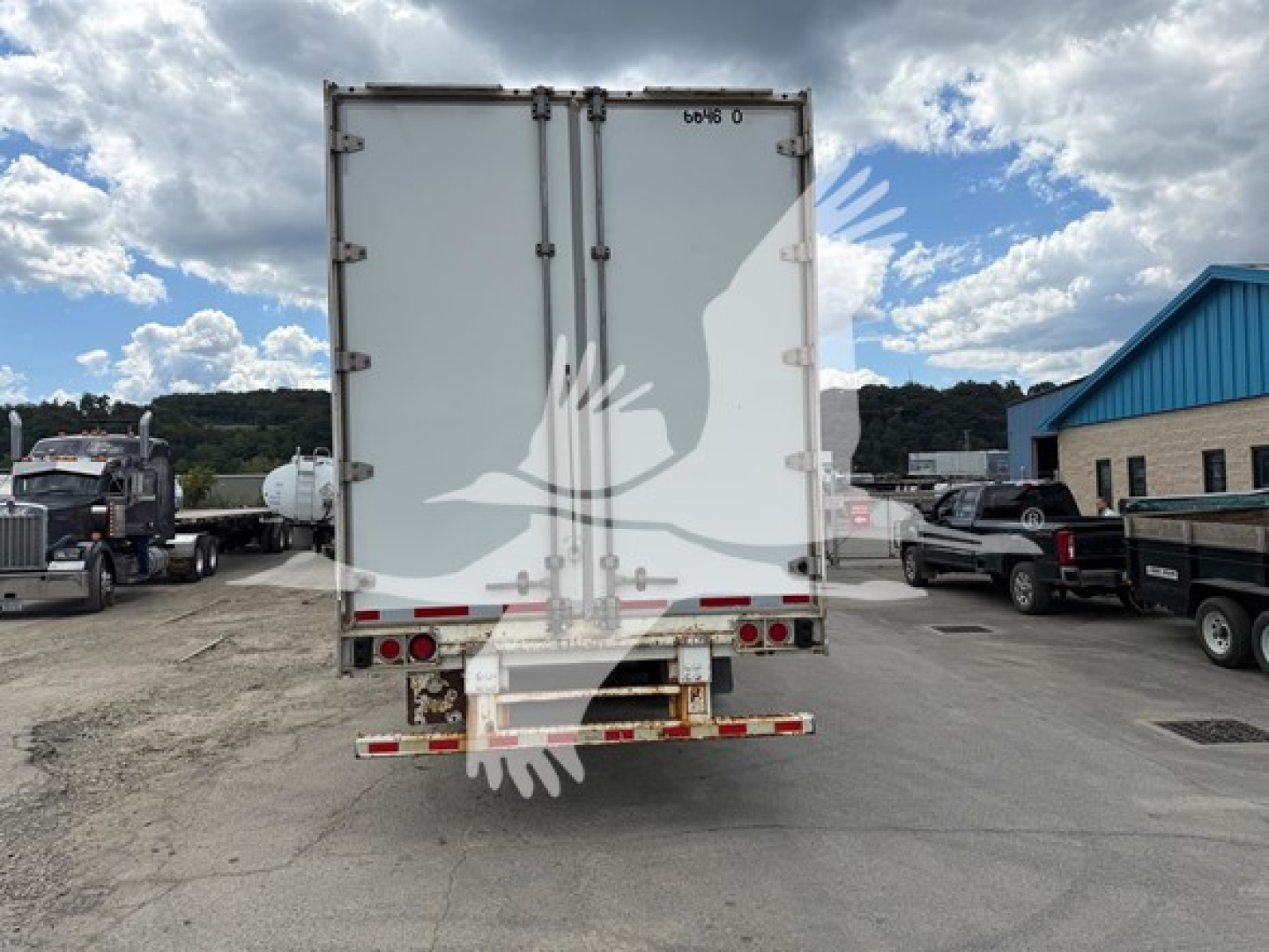 Back view of a 2013 Great Dane swing door trailer with side door. Visible text includes '6D8 0' on top rear and nozzle/hinges. Damaged rear bumper and red reflectors.