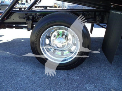 Wheel and tire on Ford F750 cab chassis showing Dunlop windshield? Actually text visible: 'DUNLOP' on tire sidewall and chrome wheel. No other legible text visible in image.