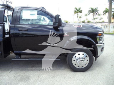 Ram 4500 Big Horn truck side view showing side mirror, front wheel, and welding truck body with RAM logo.