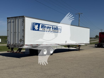 Trailer side showing River Valley Trailer Leasing logo on a white utility trailer in a parking lot.